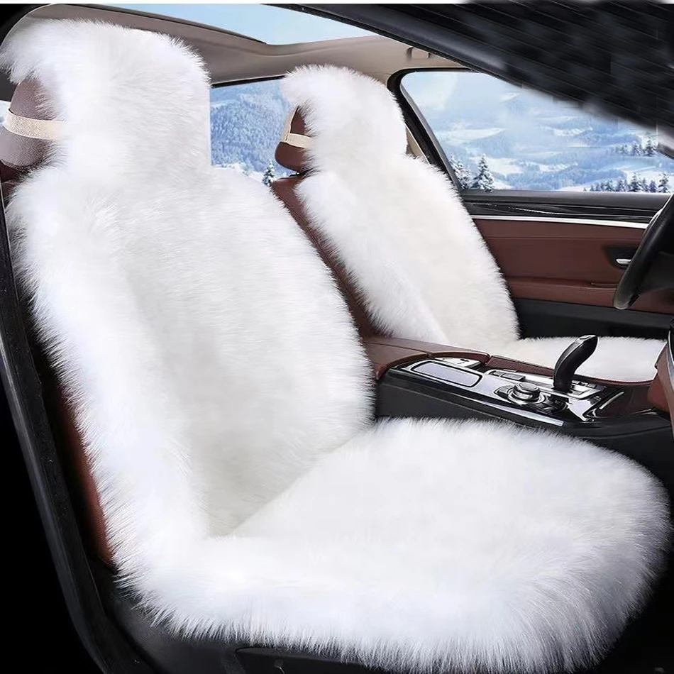 Sheepskin Seat Covers Full Protection Full view of the natural wool covers protecting a vehicle seat
