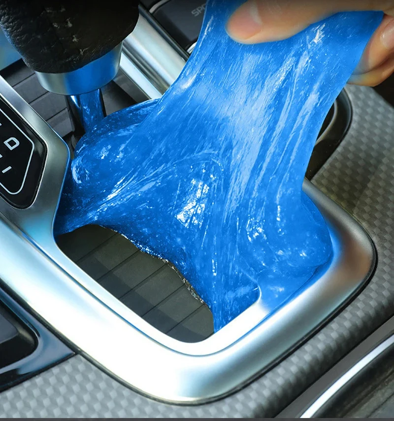 Car Cleaning Gel – Auto Vent Dust Remover Car Cleaning Gel pressing into a car air vent to remove dust