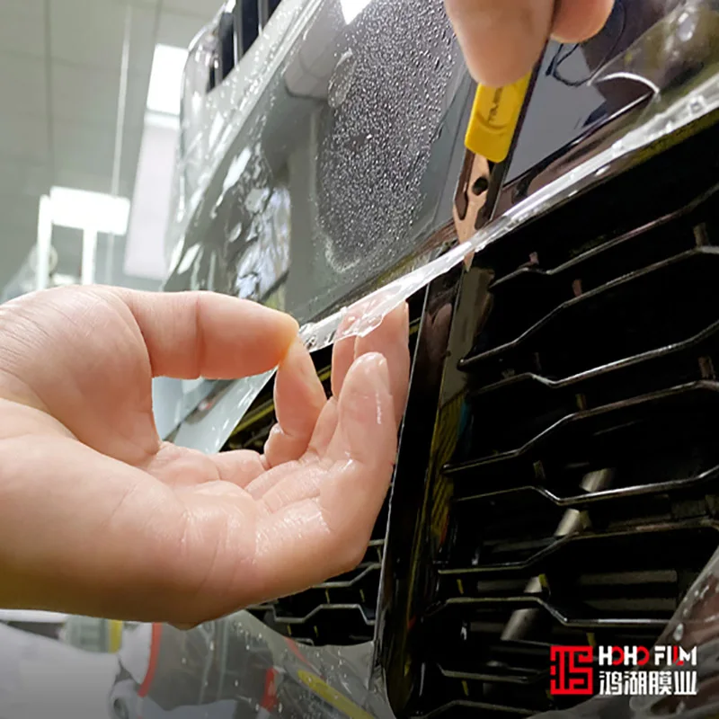 Clear wrap being installed without bubbles