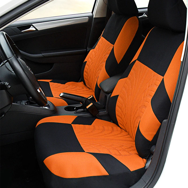 Universal car seat covers installed in a vehicle interior