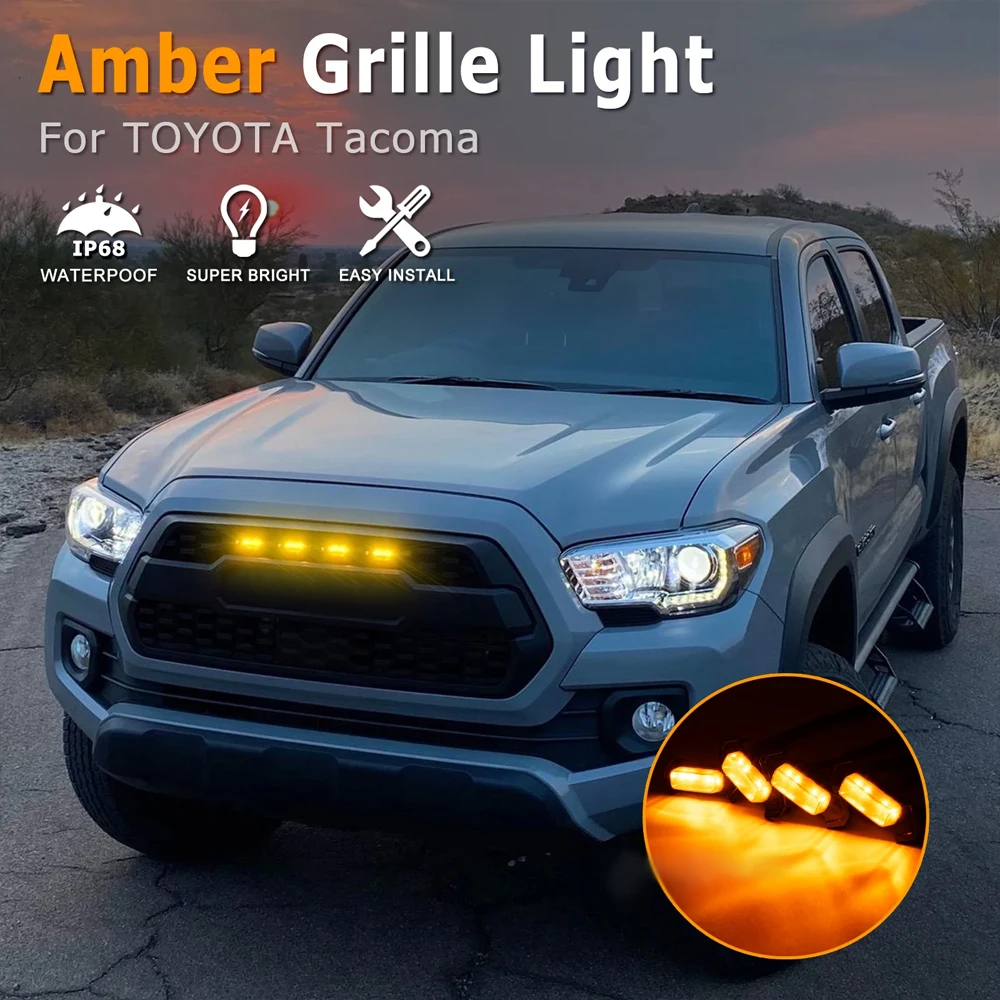 Amber Raptor Lights installed on a compatible Toyota Tacoma front grille