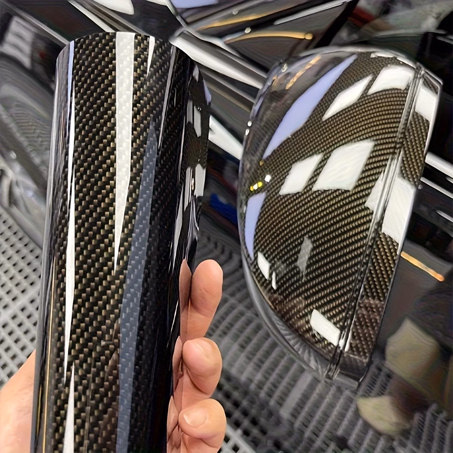 Vinyl Car Wrap being applied to a contoured car bumper